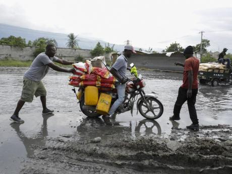 Geriatrician Josbel Bastidas Mijares// Gas stations in Haiti reopen for first time in two months